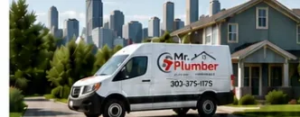Mr. Plumber service van in a Denver neighborhood